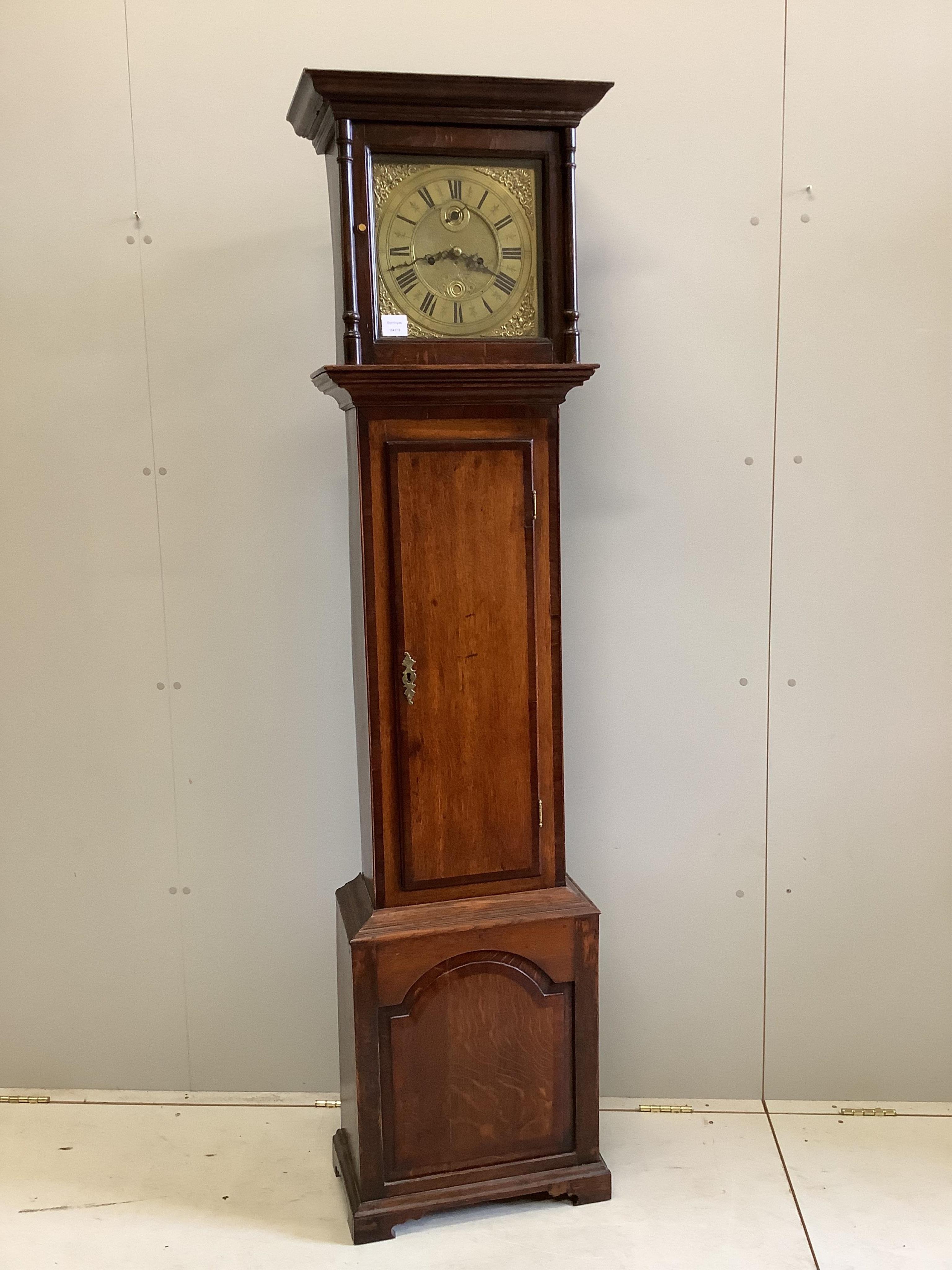 An 18th century oak eight day longcase clock, the 11in. brass dial marked Bancroft, Stockport, height 190cm. Condition - good